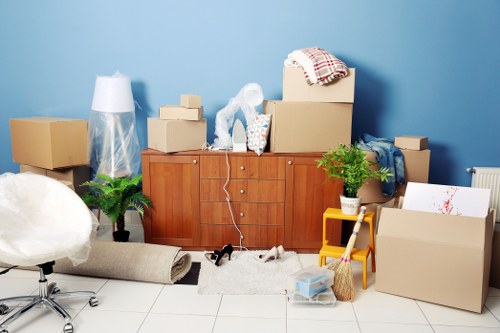 A Removal Van Mayfair team sorting recyclable moving materials in central London