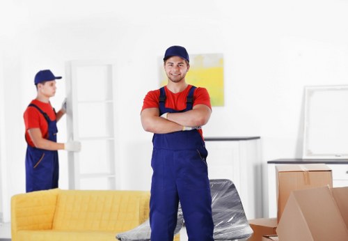 Removal team handling a move in a Mayfair townhouse area
