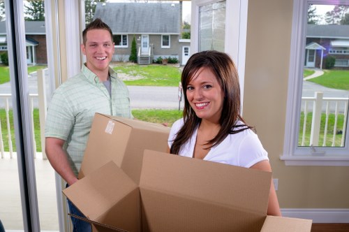 Fragile household items being carefully packed in Mayfair