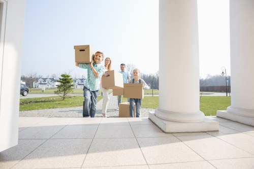 Professional flat removals preparation in Mayfair with protected furniture and boxed items