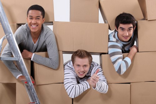 Local man and van team handling a move in a Mayfair street