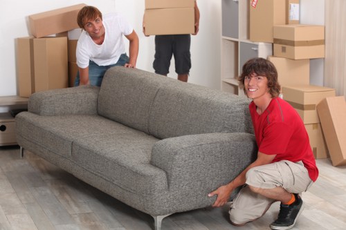 Professional movers loading a van in central London