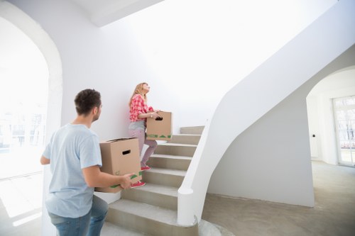 PPE and safe lifting practices during a Mayfair removals job