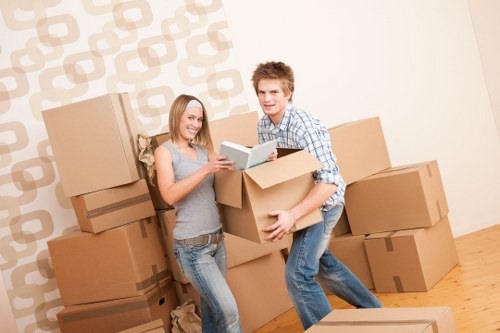 Professional movers loading furniture into a moving truck in Mayfair