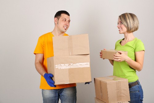 Professional moving team handling items for a Mayfair relocation