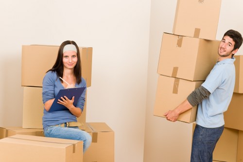 Professional moving truck loading items in central London
