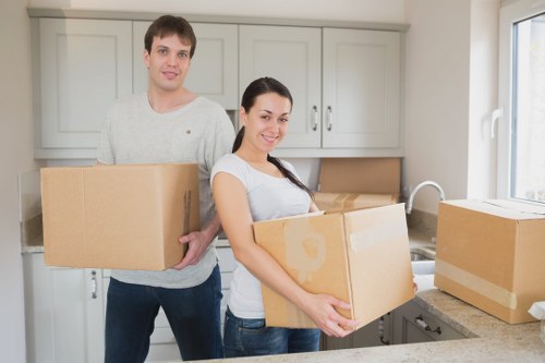 Packing and labeling boxes before a moving truck arrives in Mayfair